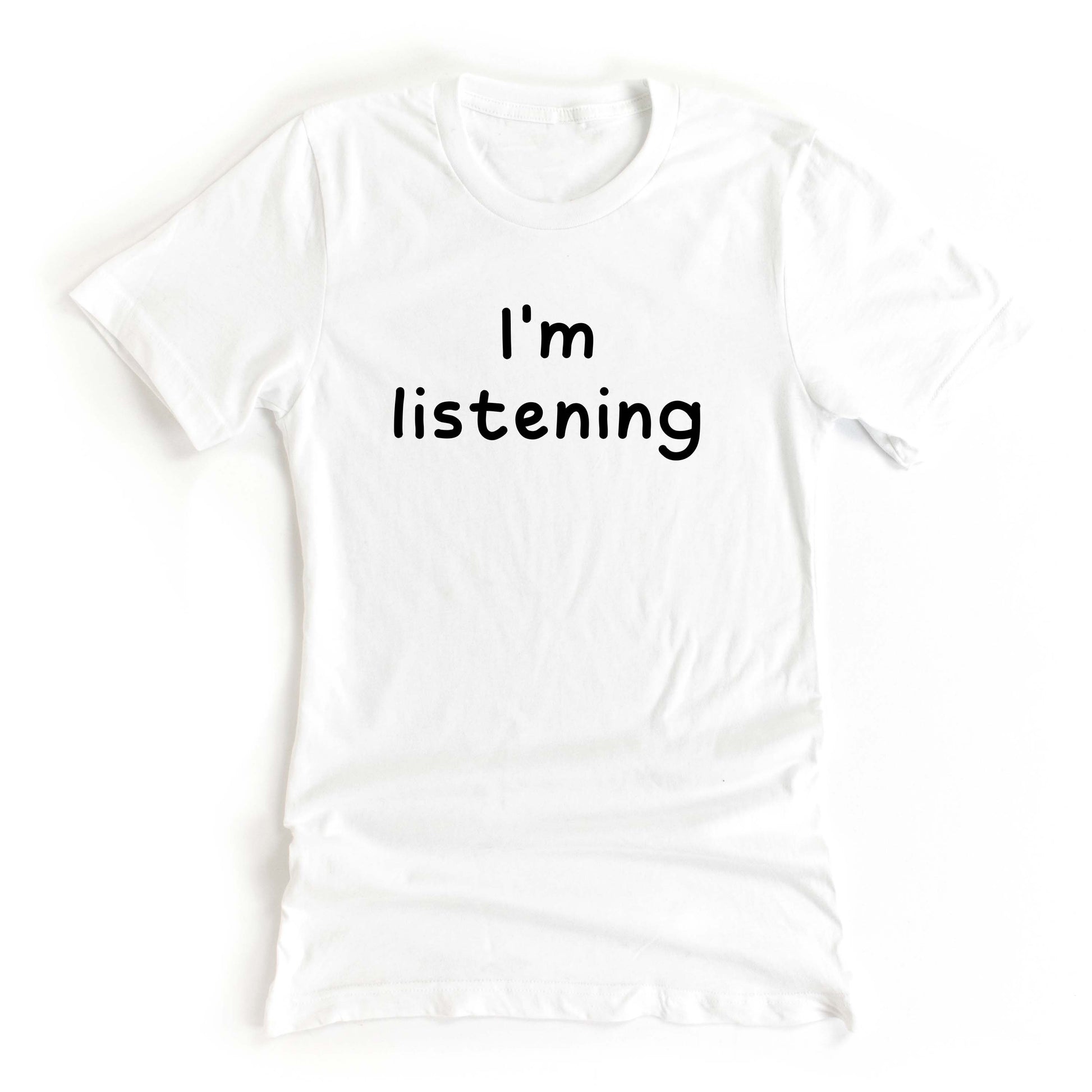 White tshirt on a white background with the text Im Listening in black ink 